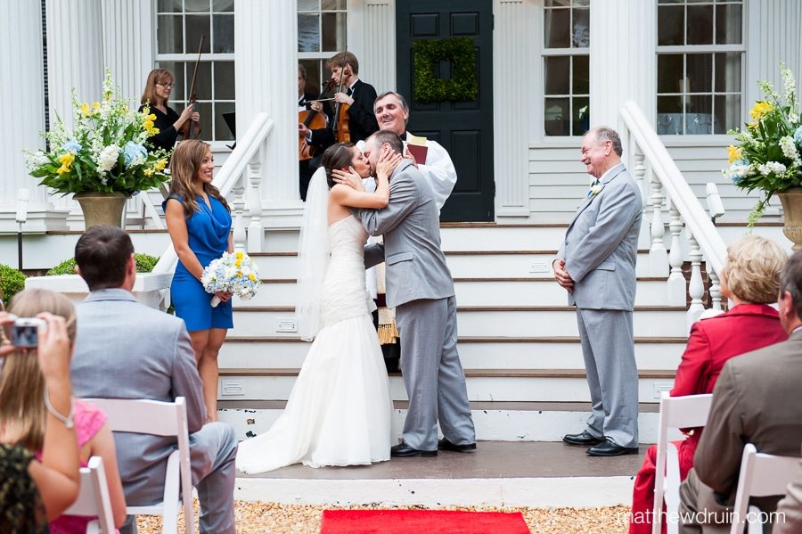 Atlanta Wedding Photographer Matthew Druin Atlanta bride and groom kissing at wedding alter at Naylor Hall in Roswell matthewdruin.com