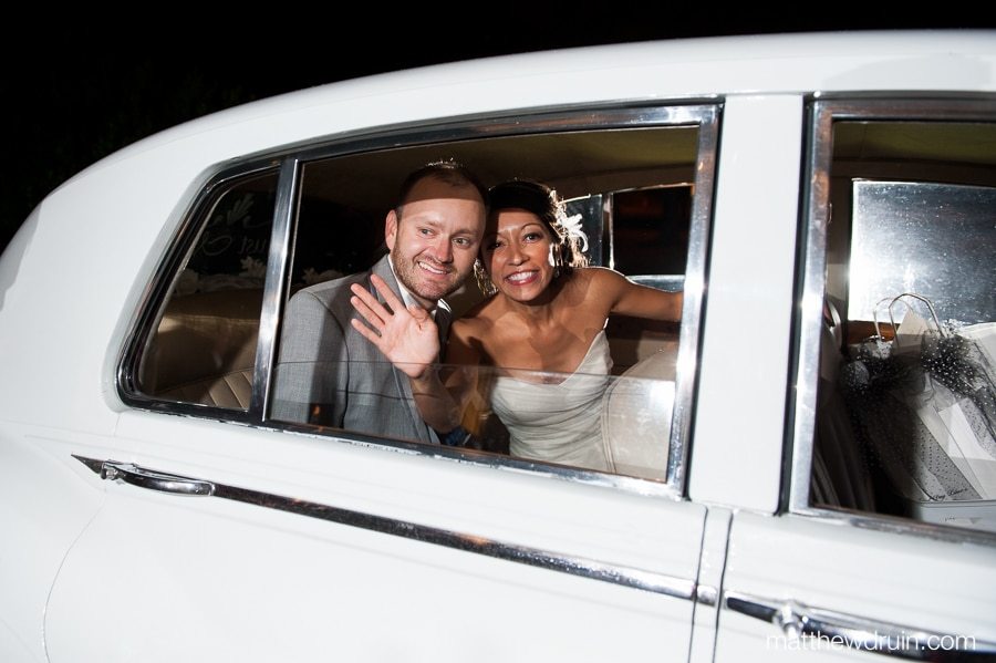 Atlanta Wedding Photographer Matthew Druin Atlanta bride and groom leaving in vintage Rolls-Royce at Naylor Hall wedding matthewdruin.com