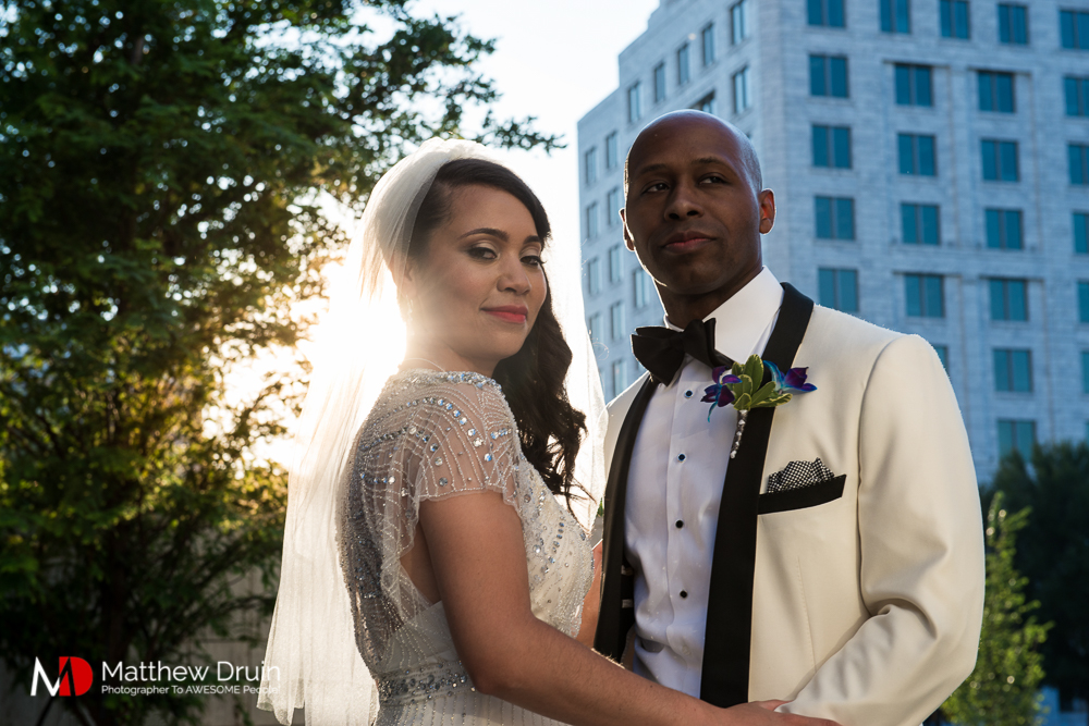 Bride and groom standing in Atlanta street at The Peachtree Club wedding