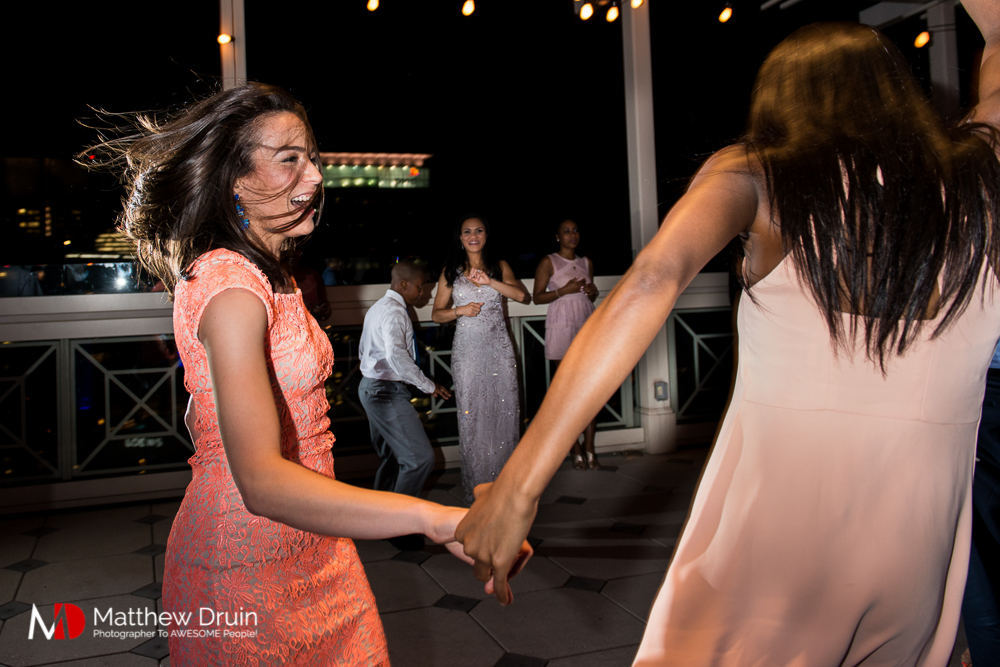 Girls swing dancing at The Peachtree Club wedding reception