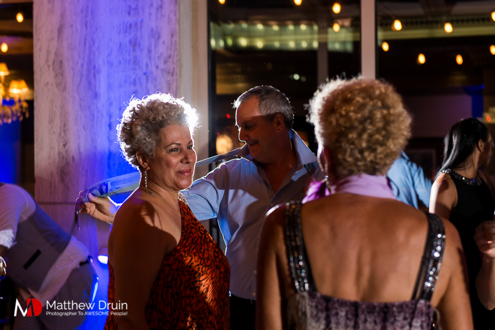 Wedding guests dancing on rooftop at The Peachtree Club wedding