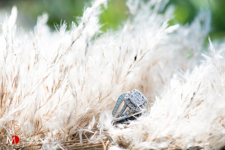 Bride and groom's wedding rings at destination Hilton Head beach wedding in South Carolina from Atlanta wedding photographers Matthew Druin + Co.